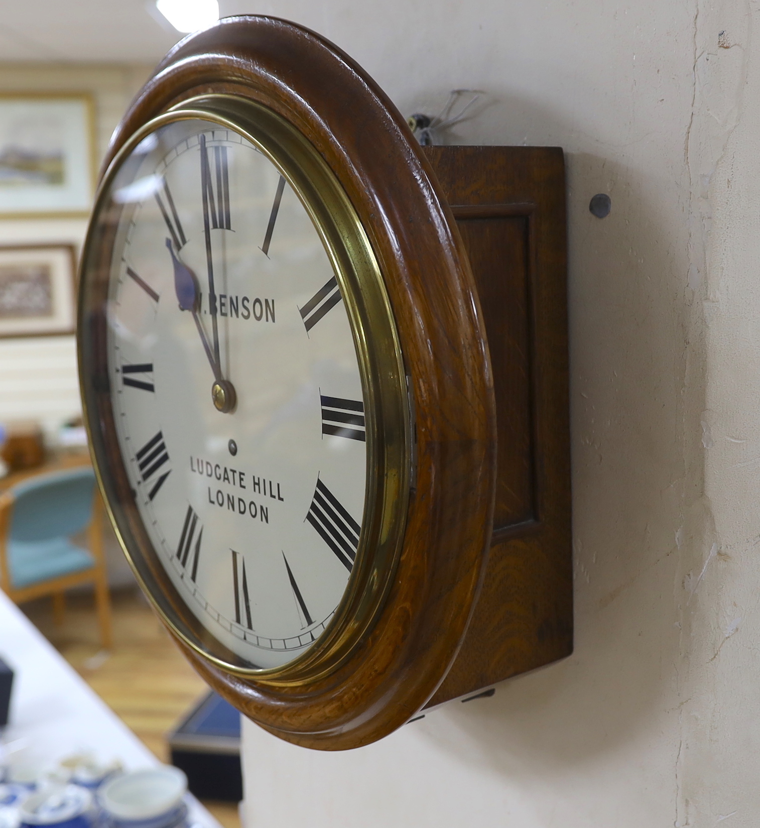 A late Victorian oak single fusee wall dial marked J. W. Benson Ludgate Hill London